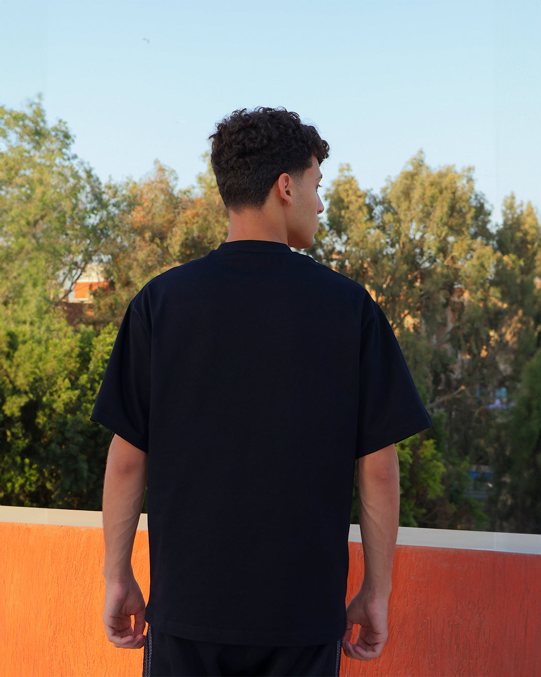 Oversized T-Shirt "بلمع"